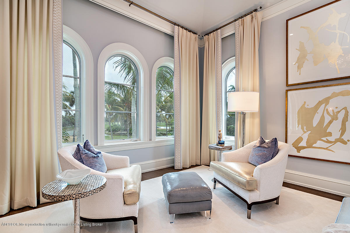 8 Golfview Road Palm Beach, FL 33480 - Photo 29 of 61 a living room with furniture and a large window
