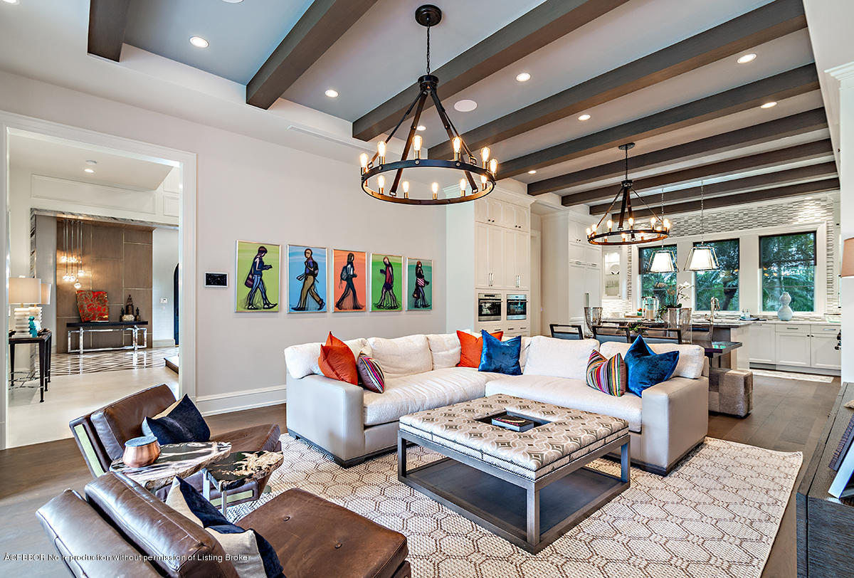 8 Golfview Road Palm Beach, FL 33480 - Photo 4 of 61 a living room with furniture a rug and a chandelier