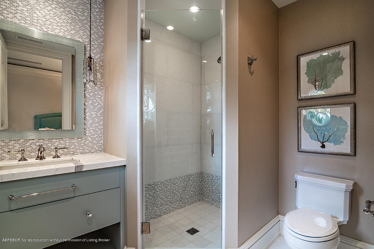 8 Golfview Road Palm Beach, FL 33480 - Photo 38 of 61 a bathroom with a sink toilet and shower