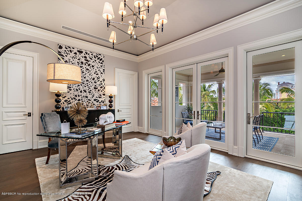 8 Golfview Road Palm Beach, FL 33480 - Photo 39 of 61 a living room with furniture and a large window