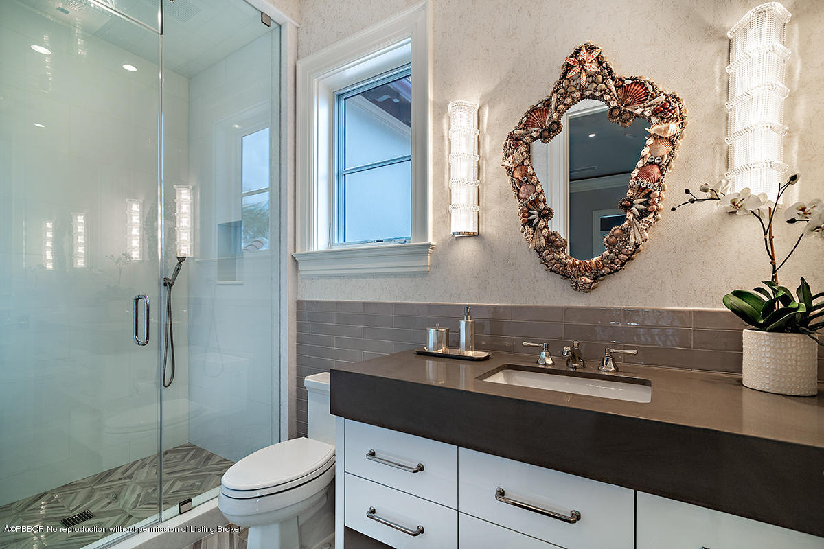8 Golfview Road Palm Beach, FL 33480 - Photo 40 of 61 a bathroom with a sink a toilet and shower