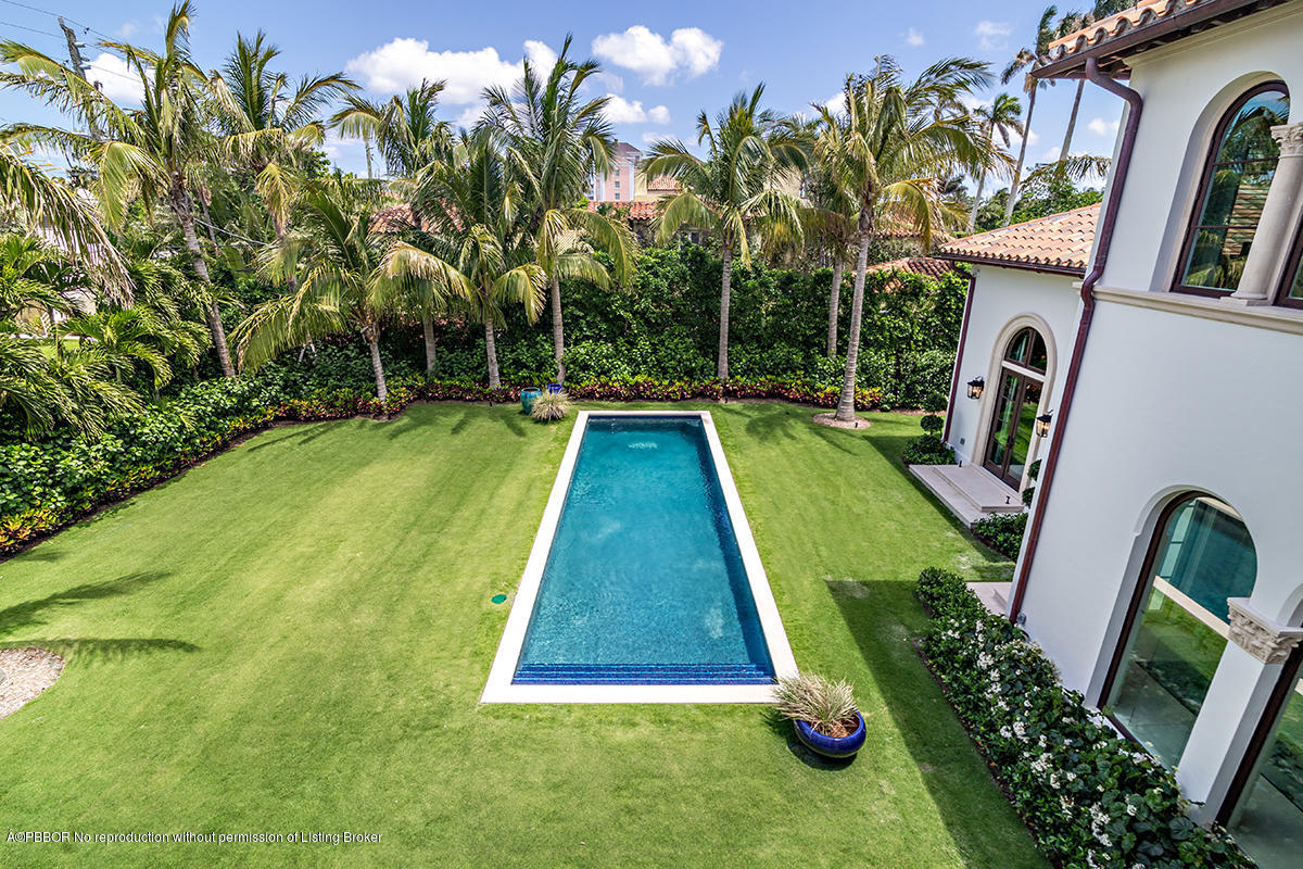 8 Golfview Road Palm Beach, FL 33480 - Photo 46 of 61 a view of swimming pool with a backyard