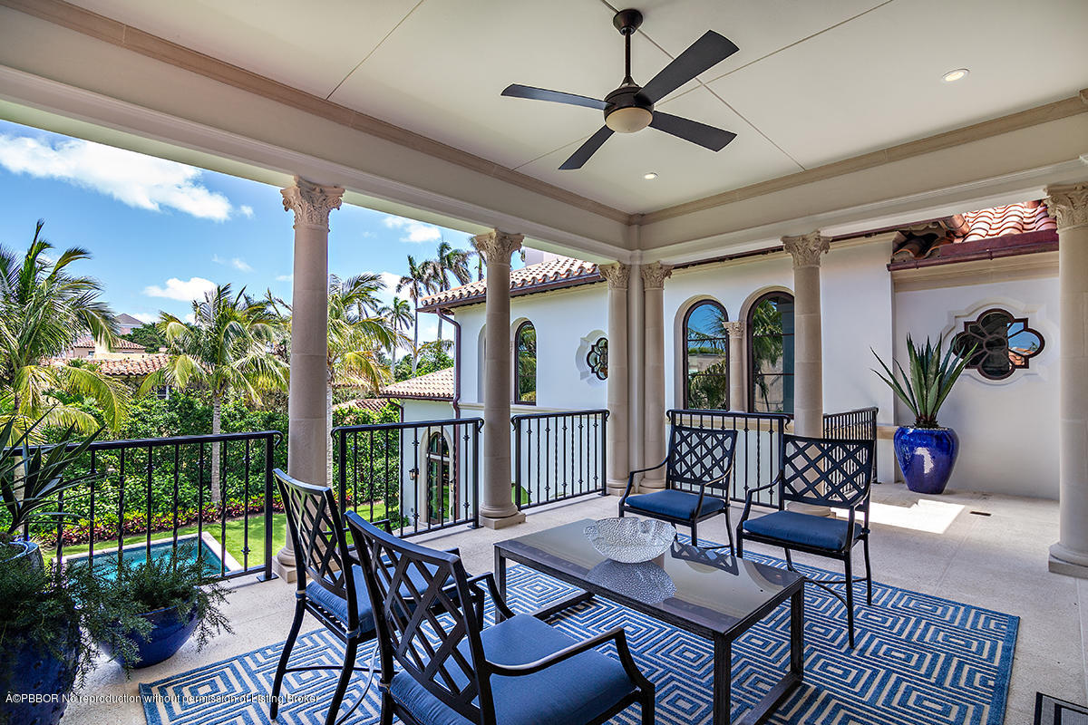 8 Golfview Road Palm Beach, FL 33480 - Photo 8 of 61 a view of a patio with a table chairs and a potted plant