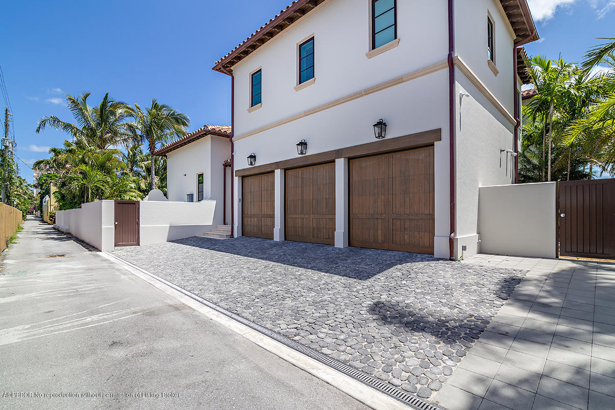 8 Golfview Road Palm Beach, FL 33480 - Photo 9 of 61 a view of a house with a yard and potted plants