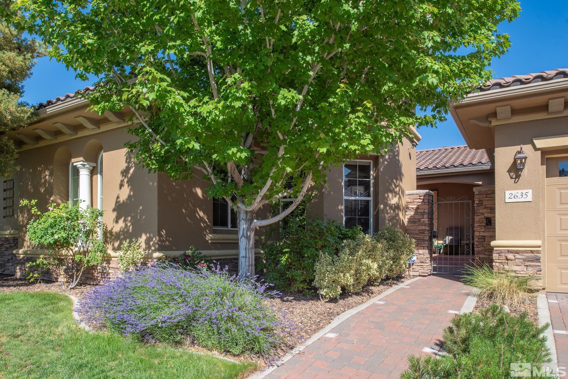 2635 Vitoria Lane Reno, NV 89521 - Photo 2 of 40 a front view of a house with garden