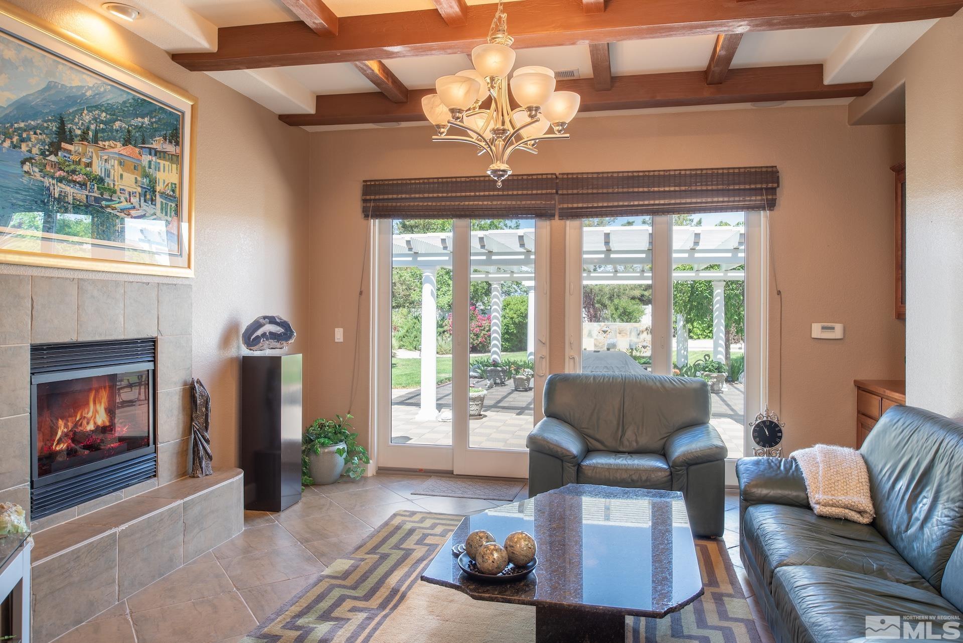 2635 Vitoria Lane Reno, NV 89521 - Photo 10 of 40 a living room with furniture and a fireplace