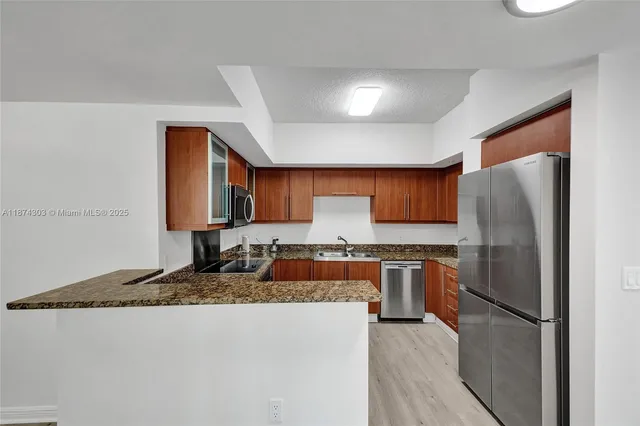 $675,000 | 888 Douglas Road, Unit 304, Coral Gables, FL 33134