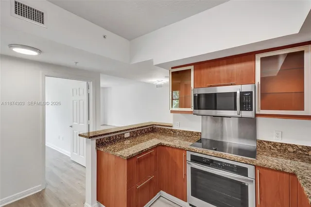 $670,000 | 888 Douglas Road, Unit 304, Coral Gables, FL 33134