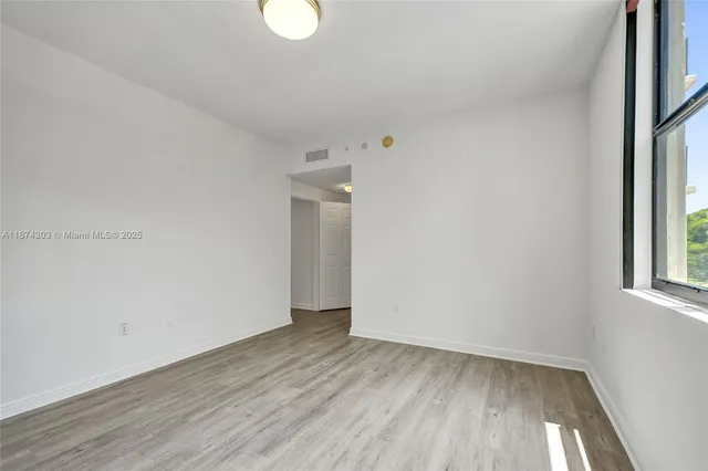 $675,000 | 888 Douglas Road, Unit 304, Coral Gables, FL 33134