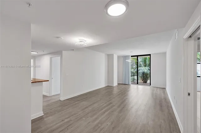 $675,000 | 888 Douglas Road, Unit 304, Coral Gables, FL 33134