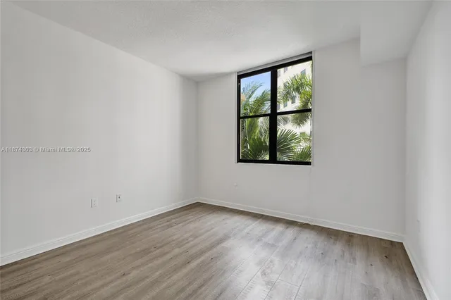 $675,000 | 888 Douglas Road, Unit 304, Coral Gables, FL 33134