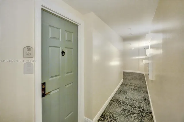 $670,000 | 888 Douglas Road, Unit 304, Coral Gables, FL 33134