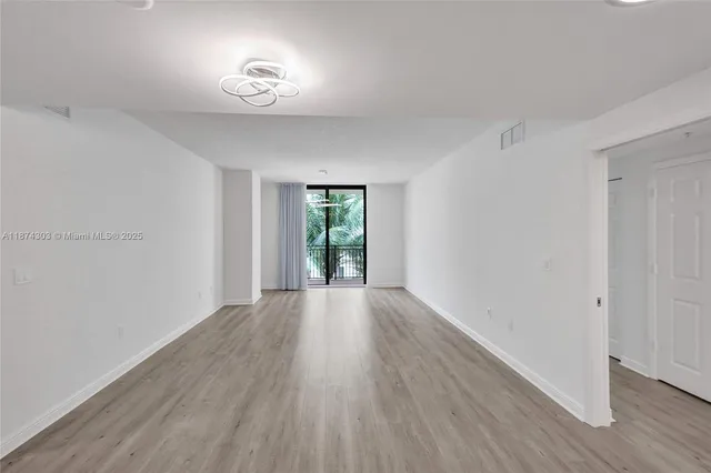 $675,000 | 888 Douglas Road, Unit 304, Coral Gables, FL 33134