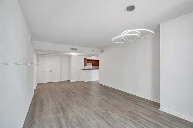 $675,000 | 888 Douglas Road, Unit 304, Coral Gables, FL 33134