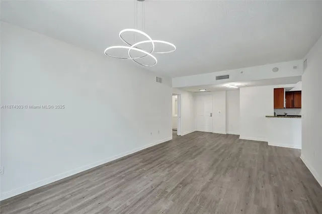 $675,000 | 888 Douglas Road, Unit 304, Coral Gables, FL 33134