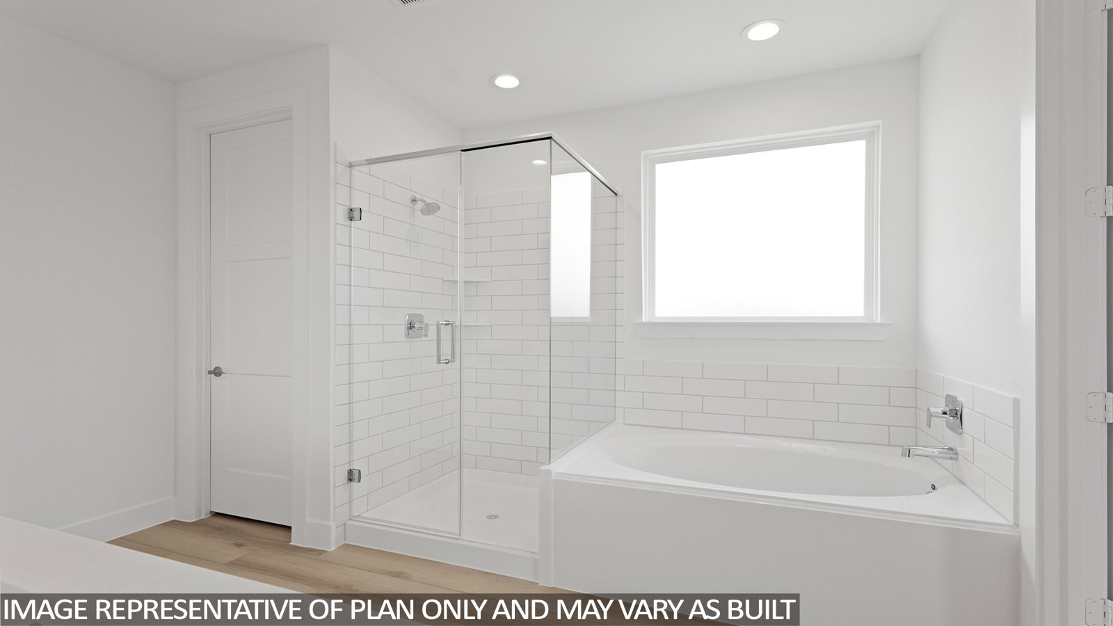 4613 Vernal Loop Conroe, TX 77303 - Photo 14 of 35 a bathroom with a bathtub and a shower