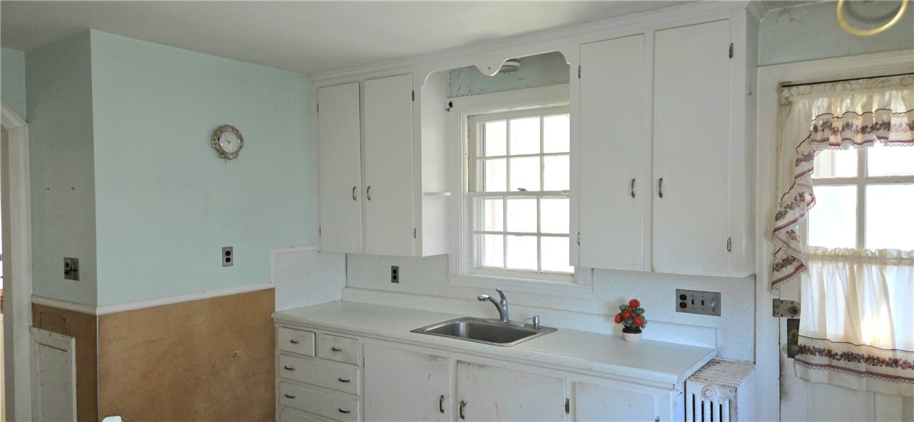 20 Intervale Road Cranston, RI 02910 - Photo 4 of 19 Back door opens to sunporch