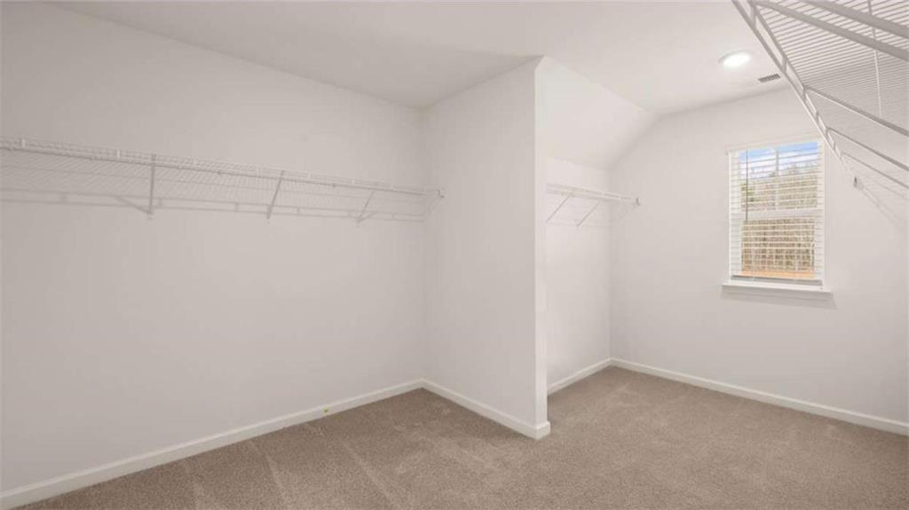 1791 Goodwin Drive Hampton, GA 30228 - Photo 32 of 43 a view of an empty room