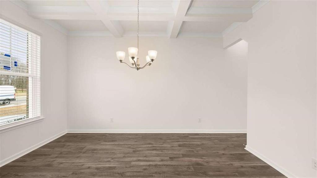 1791 Goodwin Drive Hampton, GA 30228 - Photo 6 of 43 wooden floor in a empty room with a window