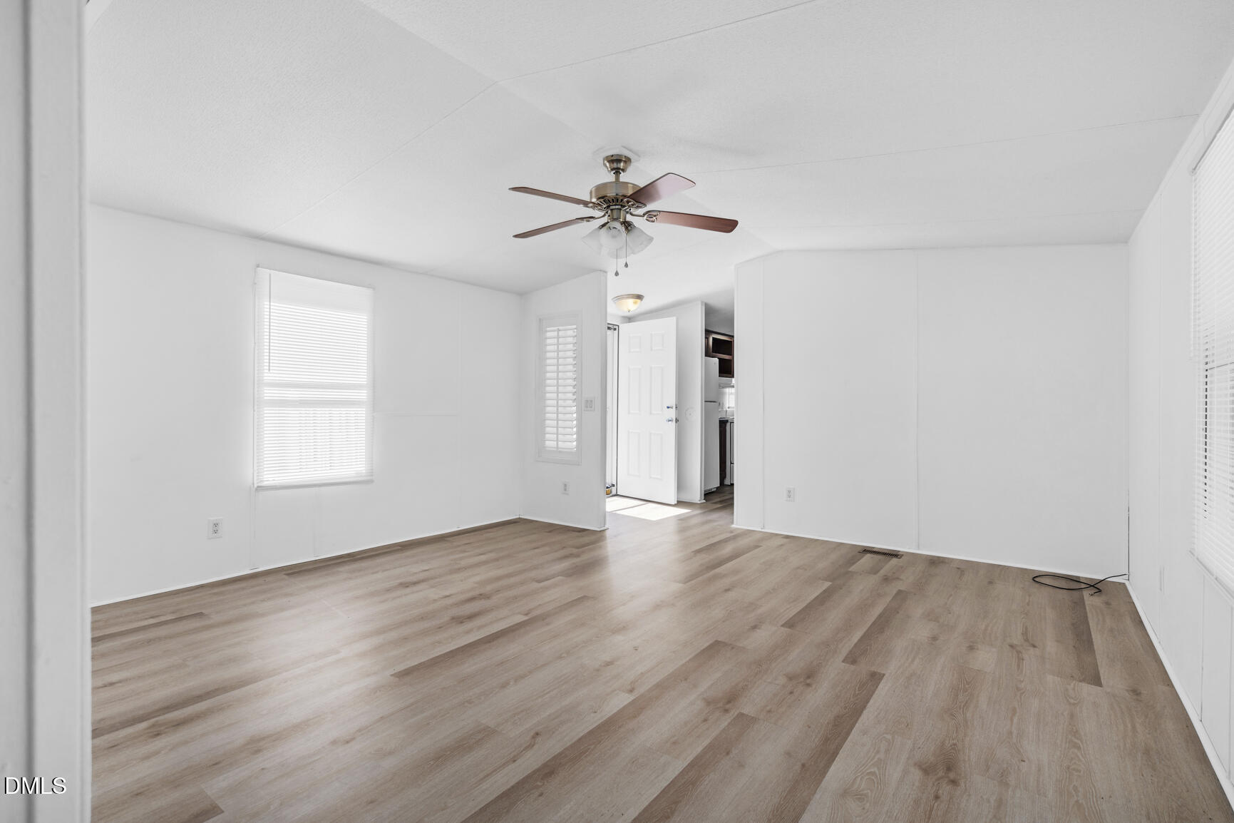 6515 Tonya Road Elm City, NC 27822 - Photo 34 of 52 wooden floor in an empty room with a window