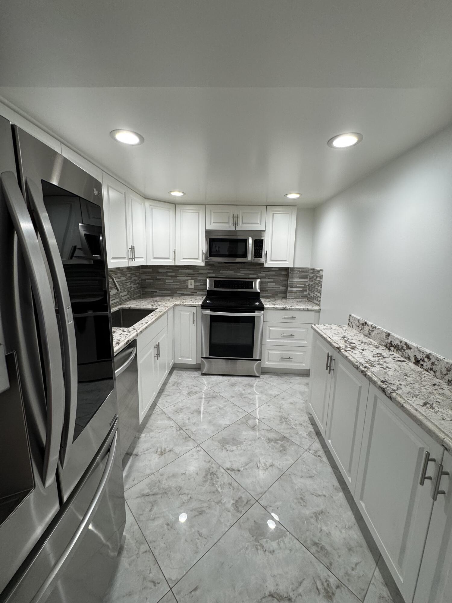 5280 Northwest 2nd Avenue, Unit PH15 Boca Raton, FL 33487 - Photo 1 of 2 IMG_4574