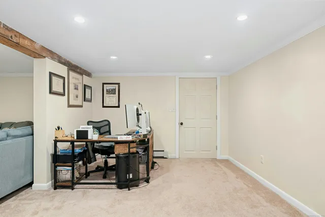 a view of a workspace with furniture