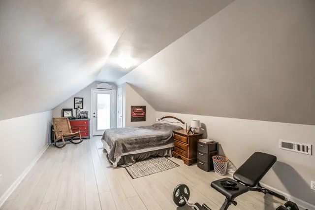 a bedroom with furniture and a couch