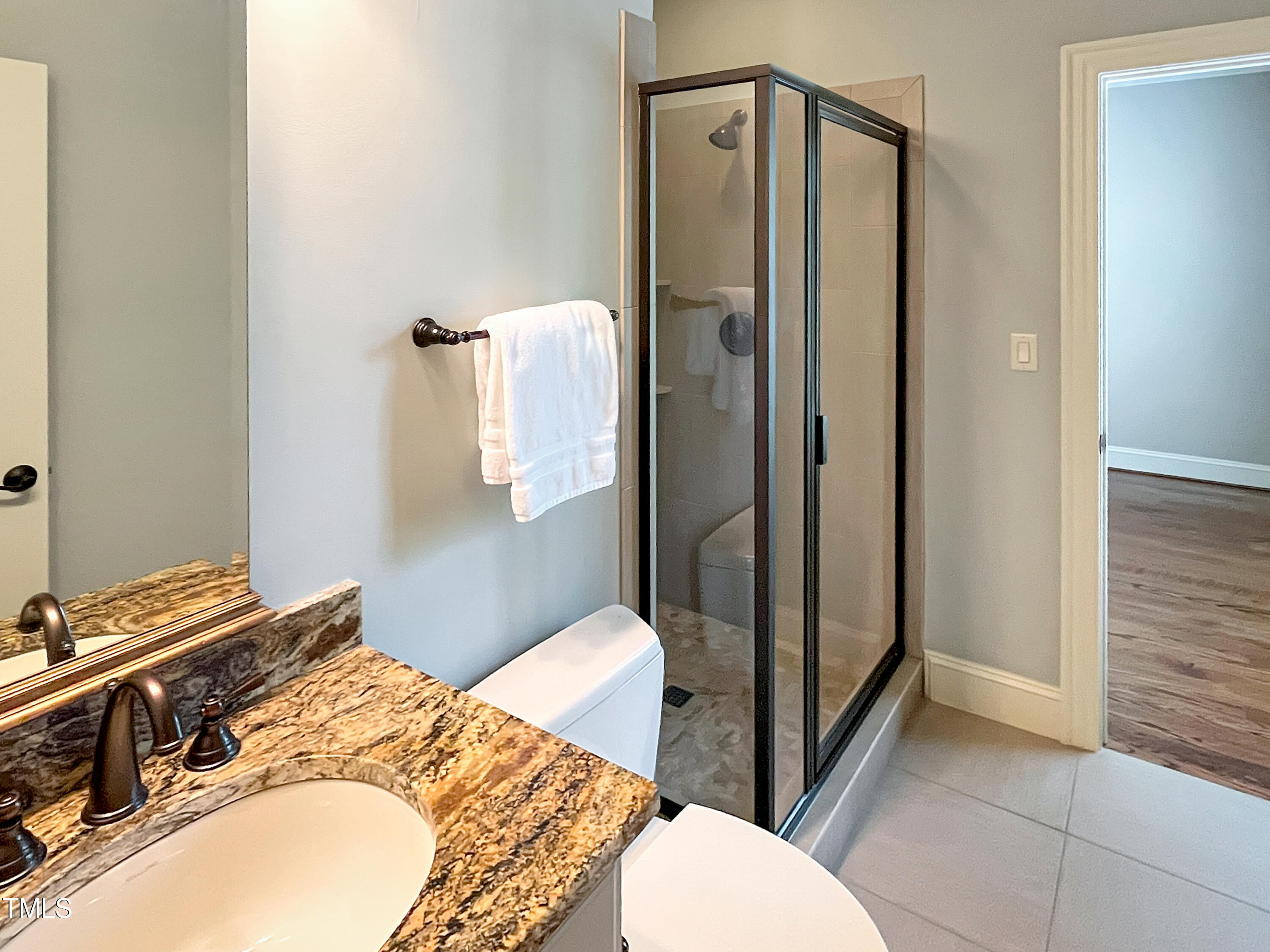 2908 Claremont Road Raleigh, NC 27608 - Photo 35 of 46 a bathroom with a sink toilet and shower