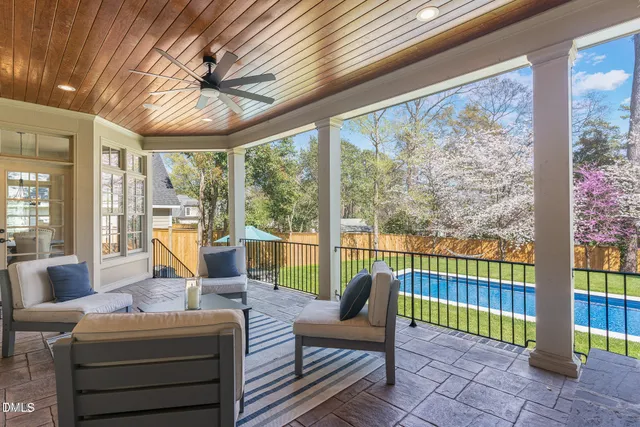 a living room with large windows