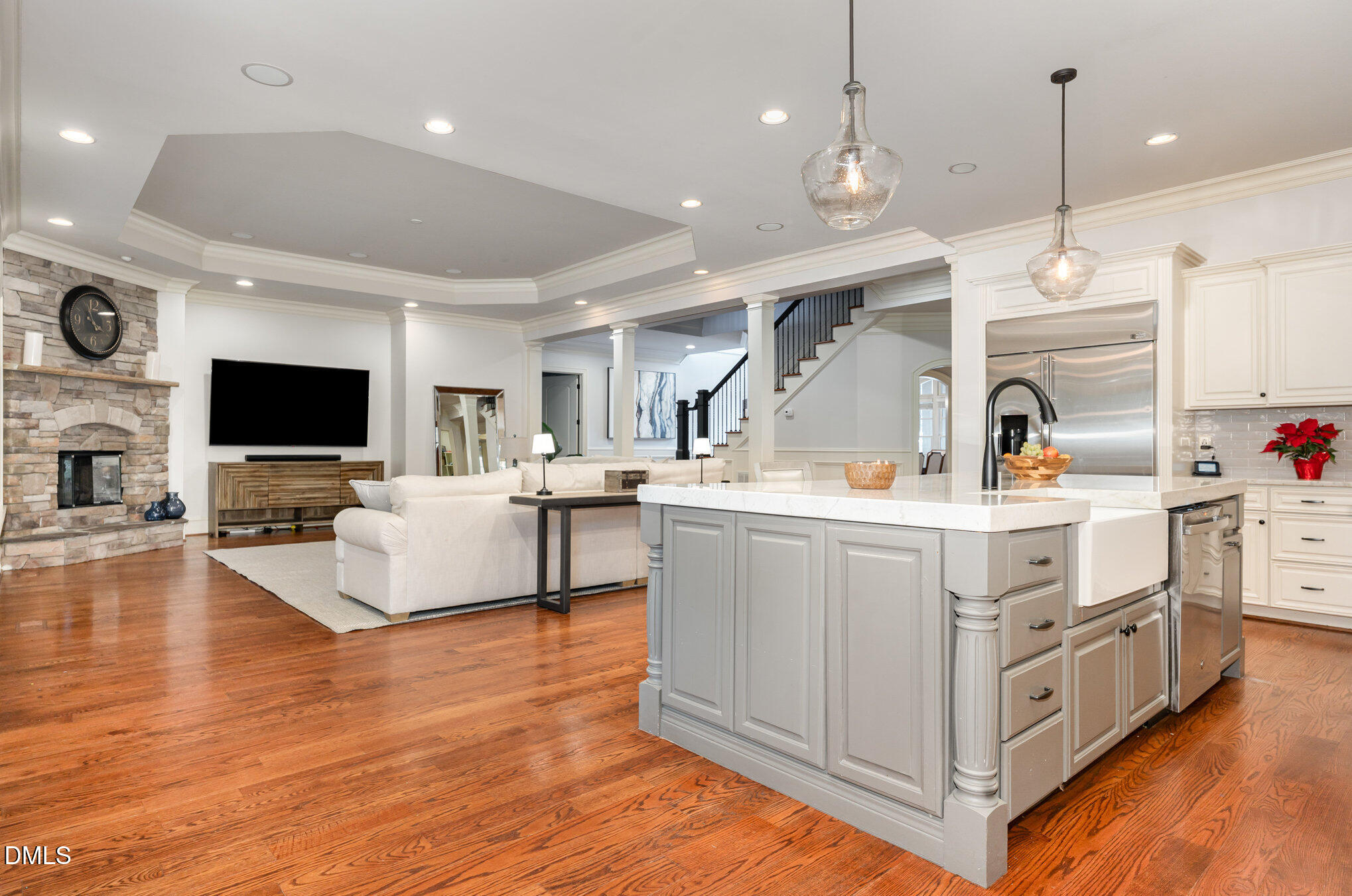 2908 Claremont Road Raleigh, NC 27608 - Photo 8 of 46 a large white kitchen with stainless steel appliances