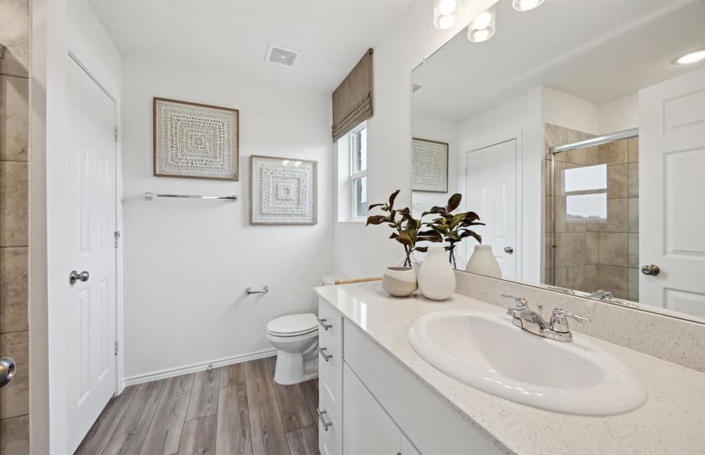 14069 Ladbroke Street Pilot Point, TX 76258 - Photo 9 of 14 Deep walk in shower in owner's suite *Model representation