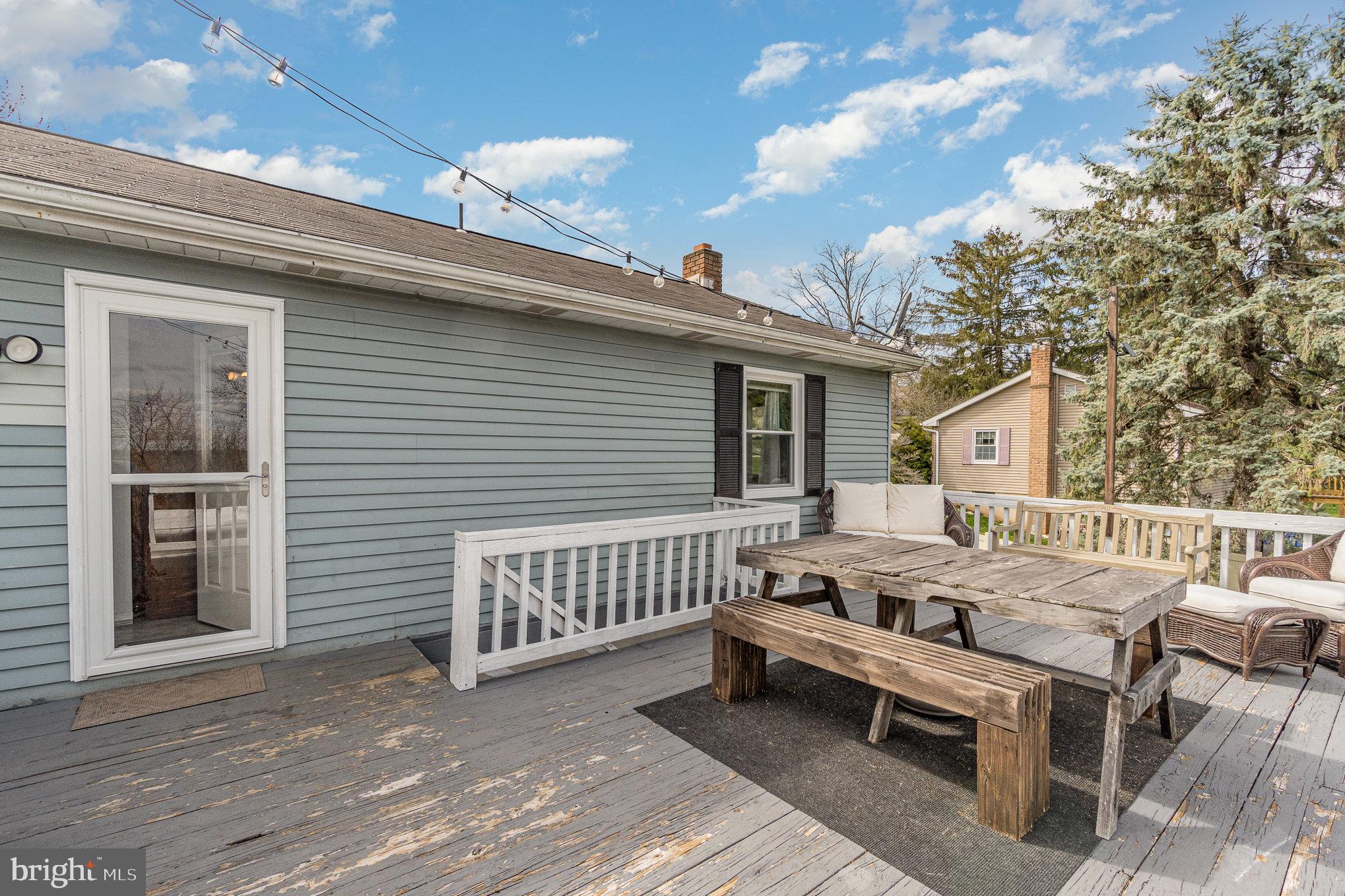 1175 Roth Church Rd Spring Grove Pa Spring Grove, PA 17362 - Photo 29 of 47 a view of a patio with a table and chairs