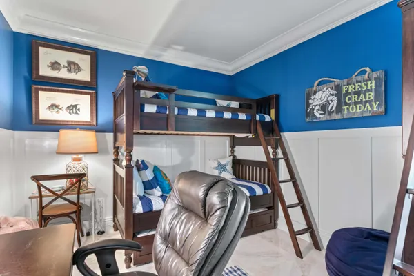 a living room with lots of furniture and lots of furniture