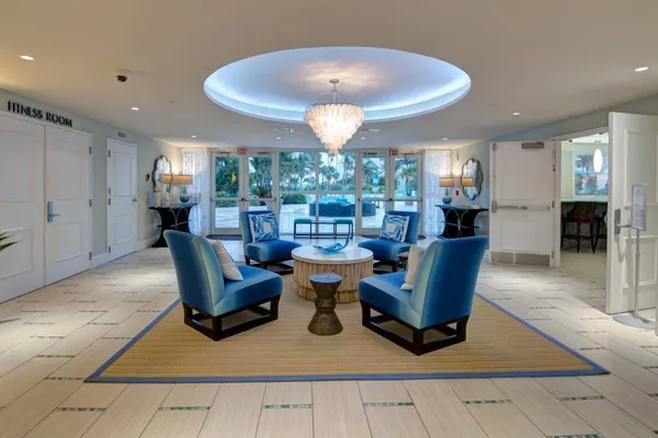 a view of an outside dining space with furniture