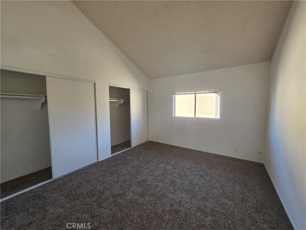 14839 Sherman Way, Unit 6 Van Nuys, CA 91405 - Photo 12 of 23 an empty room with windows