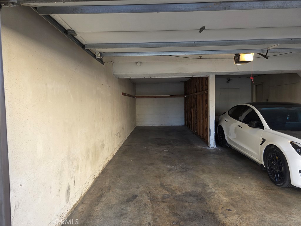 14839 Sherman Way, Unit 6 Van Nuys, CA 91405 - Photo 14 of 23 a view of car garage