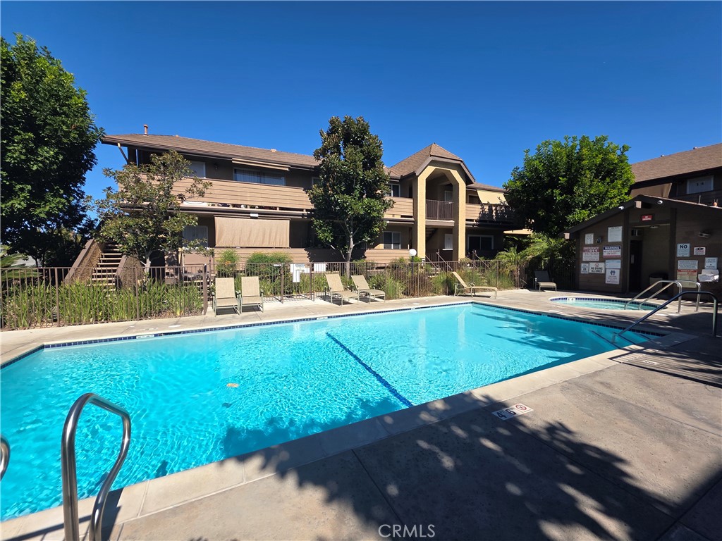14839 Sherman Way, Unit 6 Van Nuys, CA 91405 - Photo 20 of 23 a view of a swimming pool with a patio