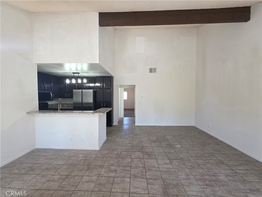 14839 Sherman Way, Unit 6 Van Nuys, CA 91405 - Photo 5 of 23 a view of a living room with a fireplace