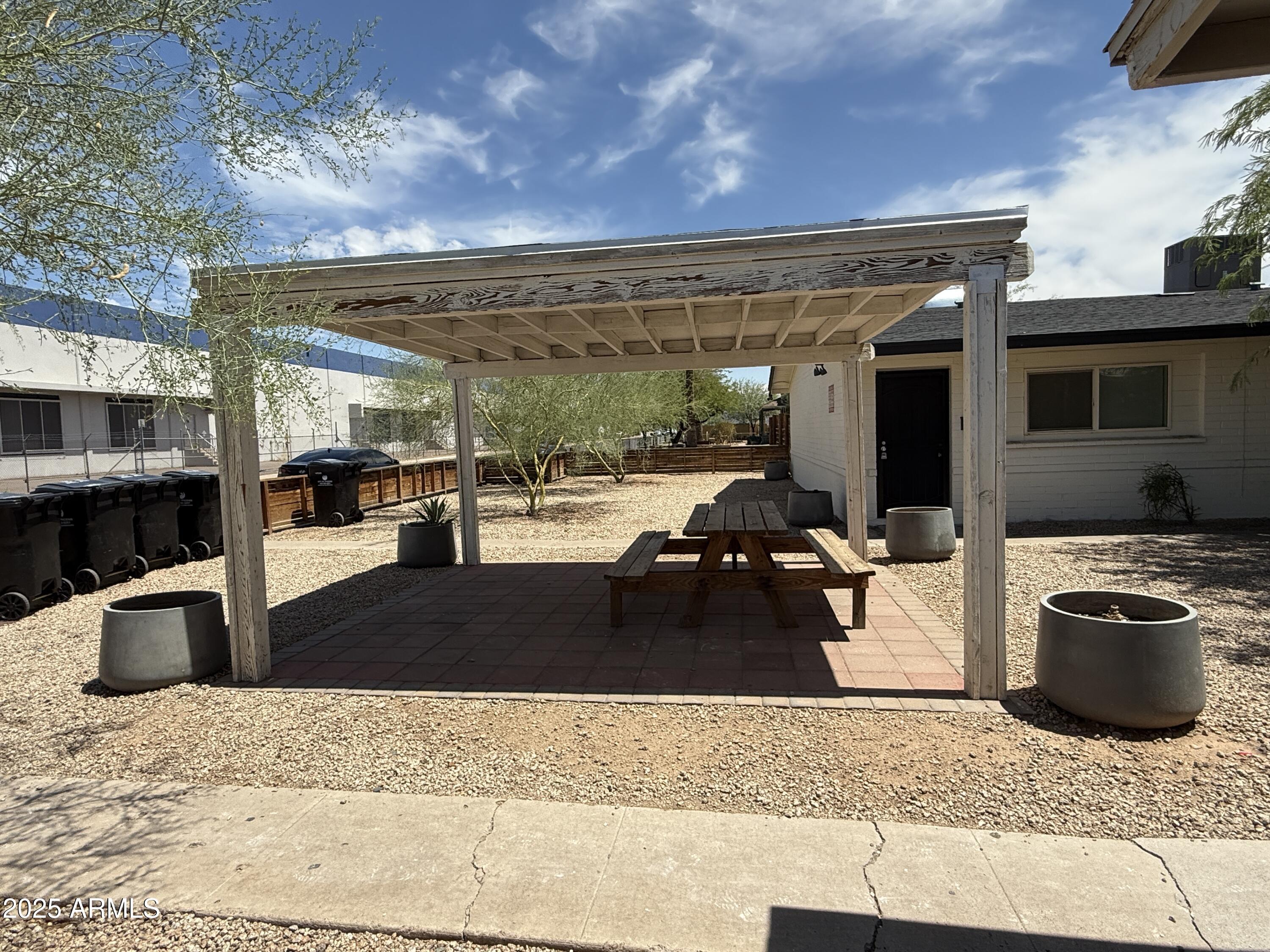 1625 West Fillmore Street, Unit 1 Phoenix, AZ 85007 - Photo 9 of 10 a view of a living room and kitchen