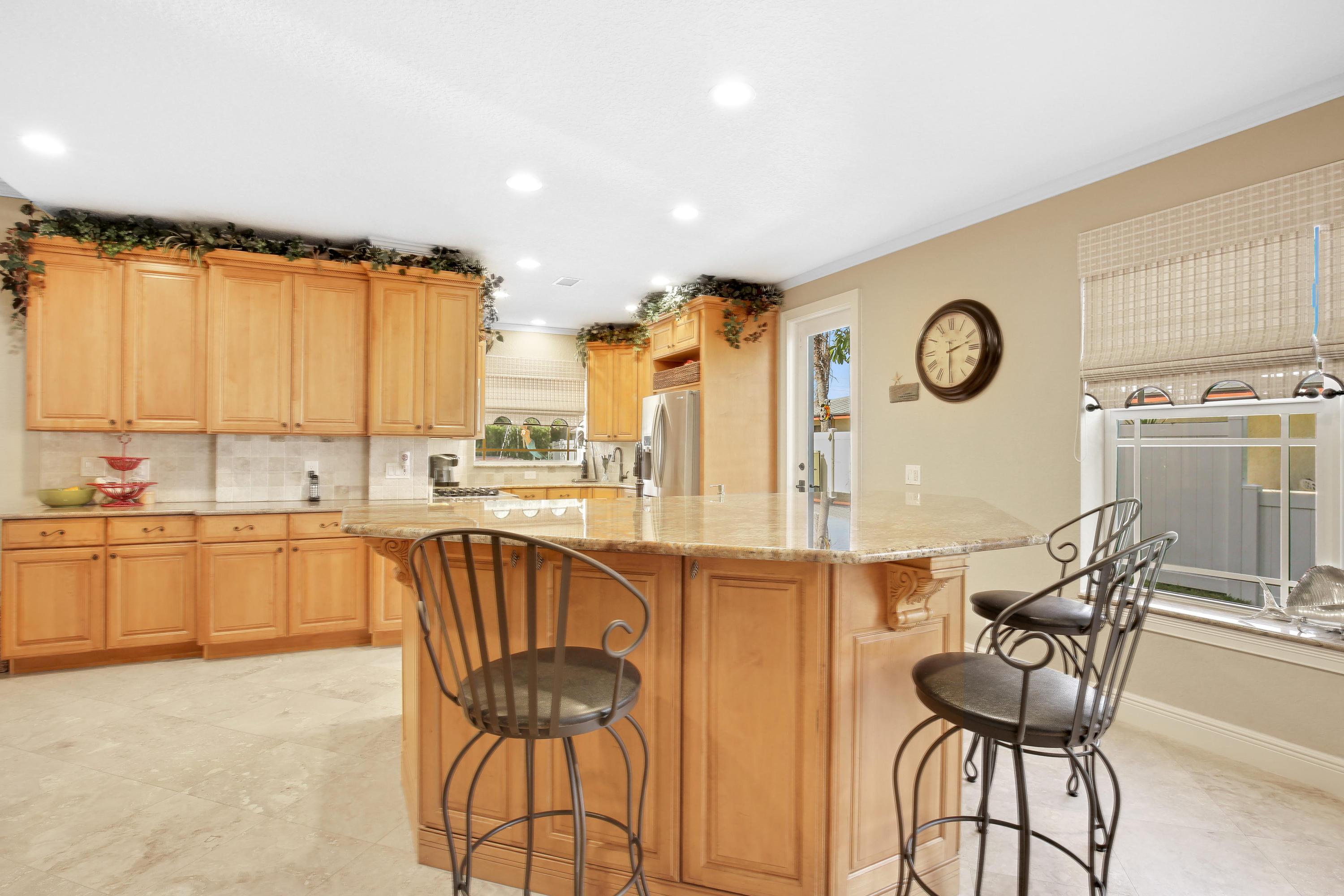 311 Center Street Jupiter, FL 33458 - Photo 14 of 30 Kitchen w/ Large Center Island