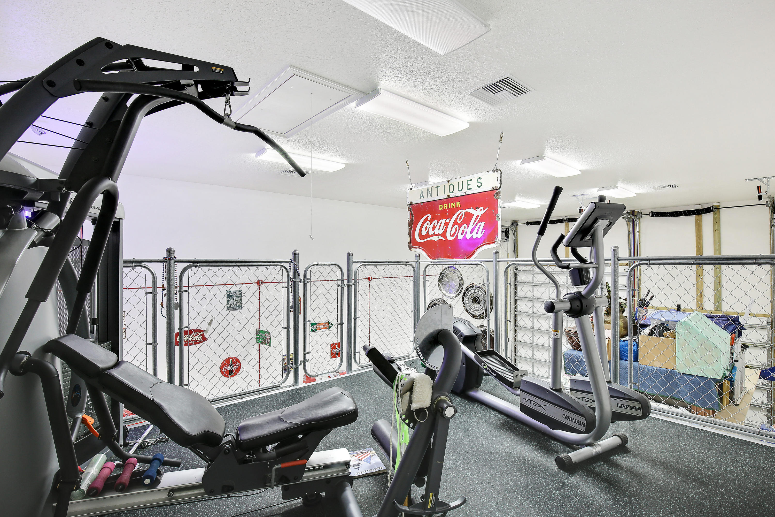 311 Center Street Jupiter, FL 33458 - Photo 9 of 30 Weight Room Over Looking Garage