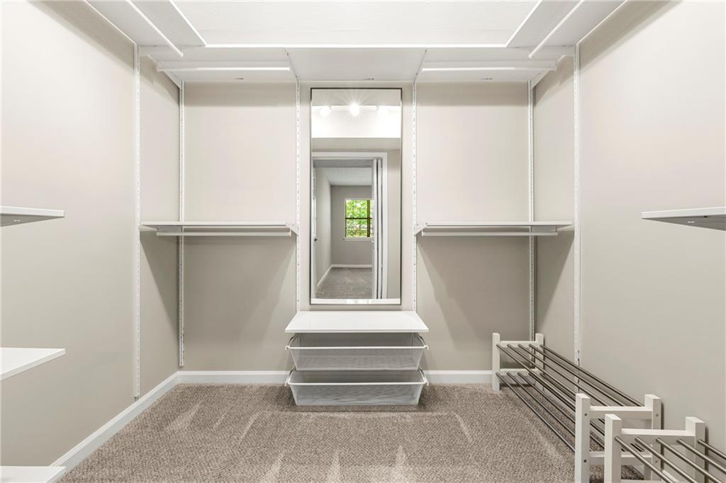 475 Mount Vernon Highway Northeast, Unit 226C Atlanta, GA 30328 - Photo 11 of 24 a view of entryway and hall with wooden floor