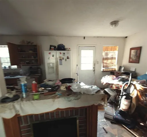 a kitchen with stainless steel appliances granite countertop a sink dishwasher stove and cabinets