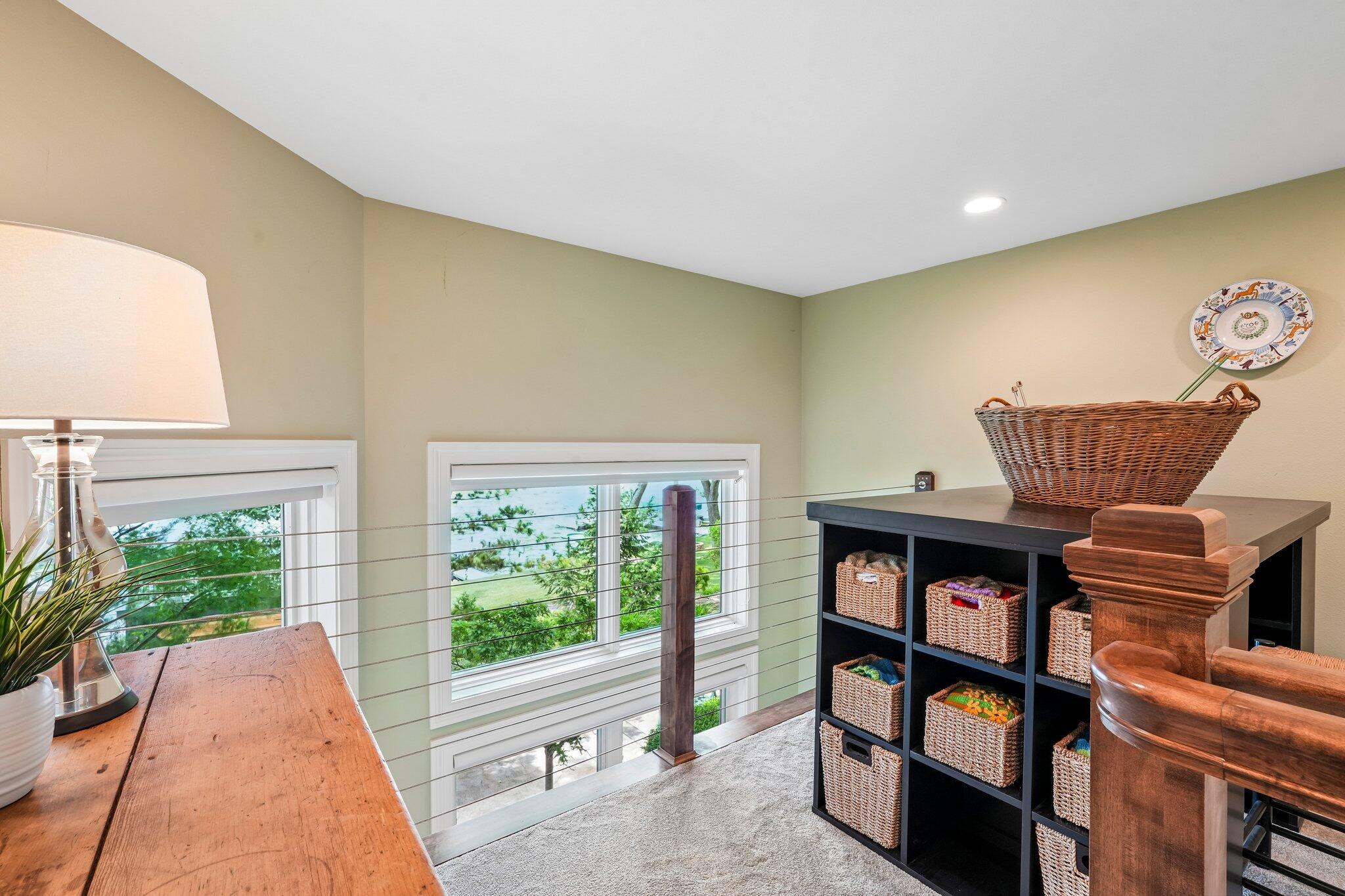 W343N6293 South Bayview Road Oconomowoc, WI 53066 - Photo 72 of 104 Craft room overlooking the lake