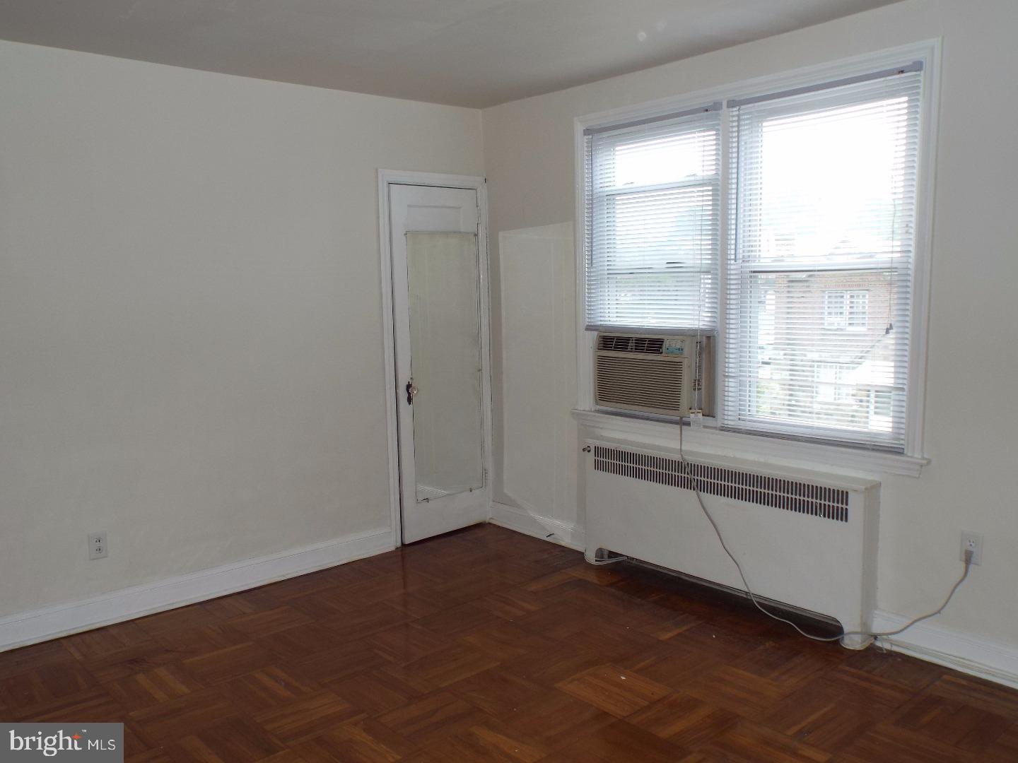 105 Ashton Road Upper Darby, PA 19082 - Photo 8 of 15 an empty room with windows