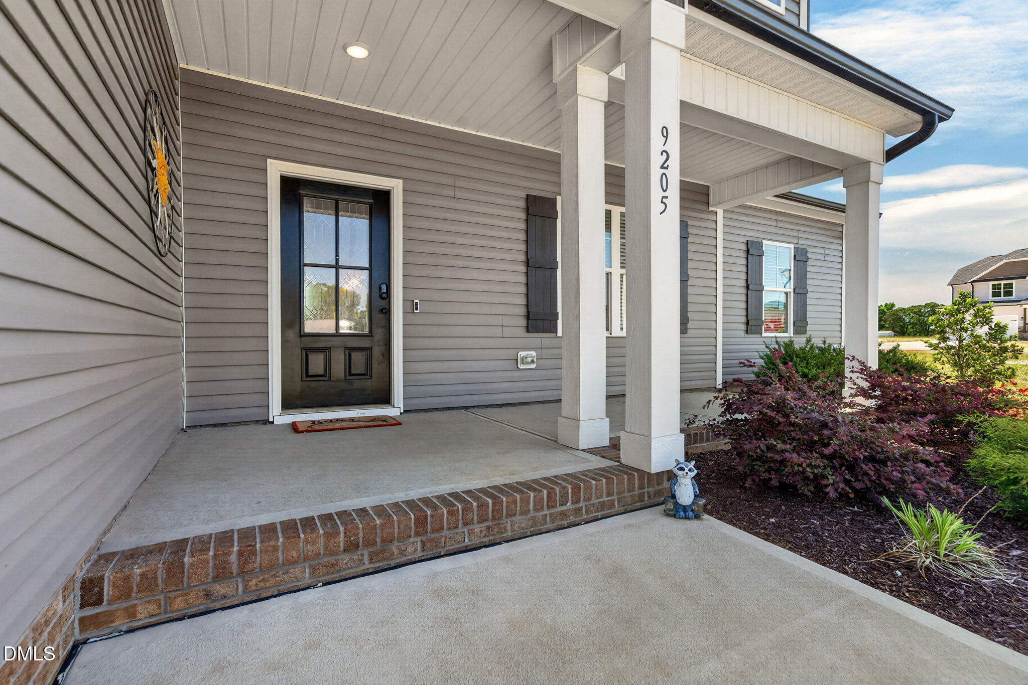 9205 Raccoon Drive Middlesex, NC 27557 - Photo 3 of 20 a view of a house with a outdoor space