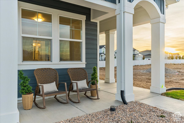 2033 Fortune Lane, Unit 462 Mapleton, UT 84664 - Photo 1 of 27 View of patio terrace at dusk