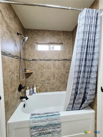 a view of a dining room with furniture wooden floor and a rug