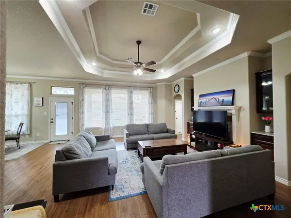 a bedroom with a bed and a table