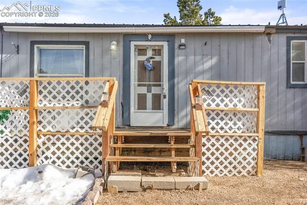 a front view of a house with a door